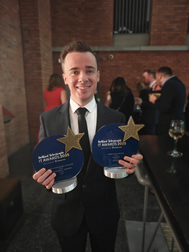 Cranmore’s James Galbraith pictured with Cranmore’s two awards for Young IT Professional of the Year and Mobile App of the Year.